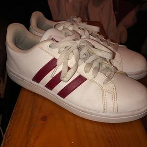 Red gently used adidas all stars
